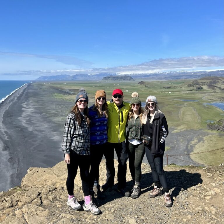 Guide and his guests at the Dyrholaey in Iceland. Part of the South Coast of Iceland tour by Arctic Mike Iceland.