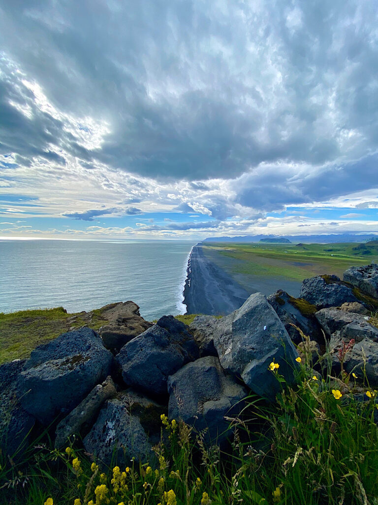 View from the Dyrholaey on the black sand beach in Iceland. Part of the South Coast of Iceland tour by Arctic Mike Iceland.