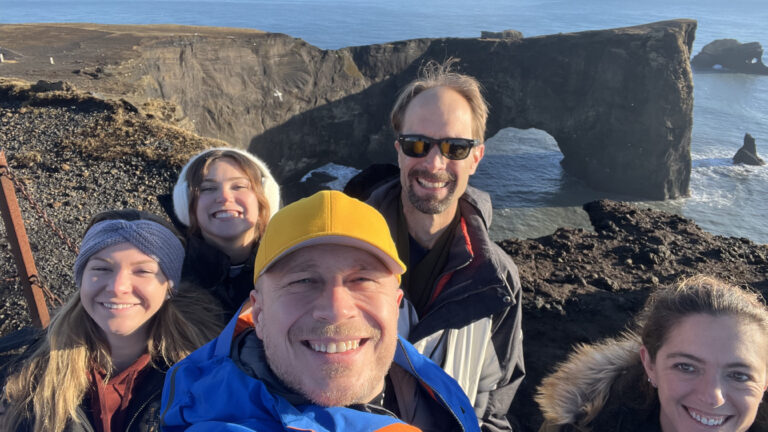 Guide and his guests at the Dyrholaey in Iceland. Part of the South Coast of Iceland tour by Arctic Mike Iceland.