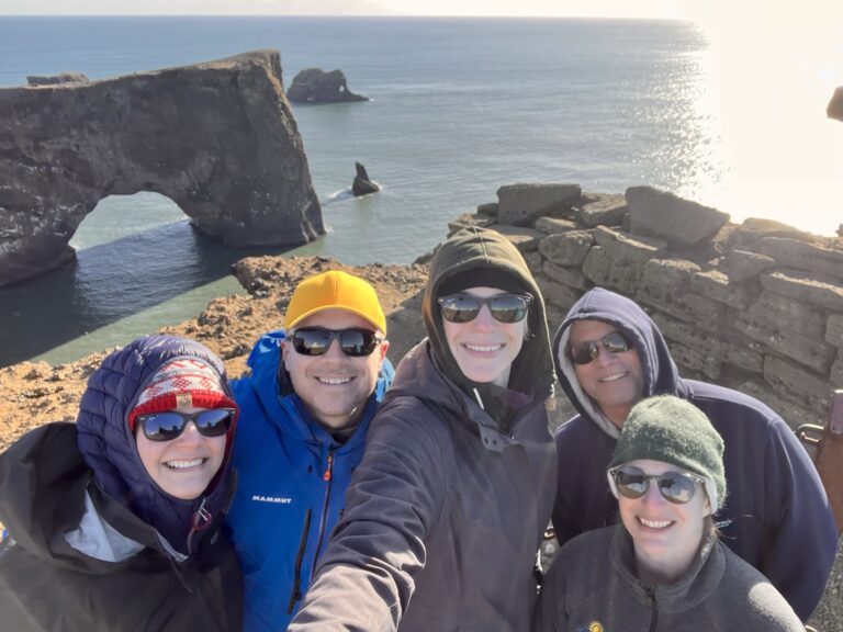 Guide and his guests at the Dyrholaey in Iceland. Part of the South Coast of Iceland tour by Arctic Mike Iceland.