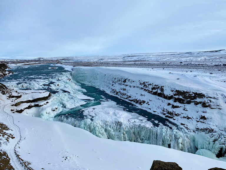 Picture of view at Gullfoss Waterfall in synny, wintery day.