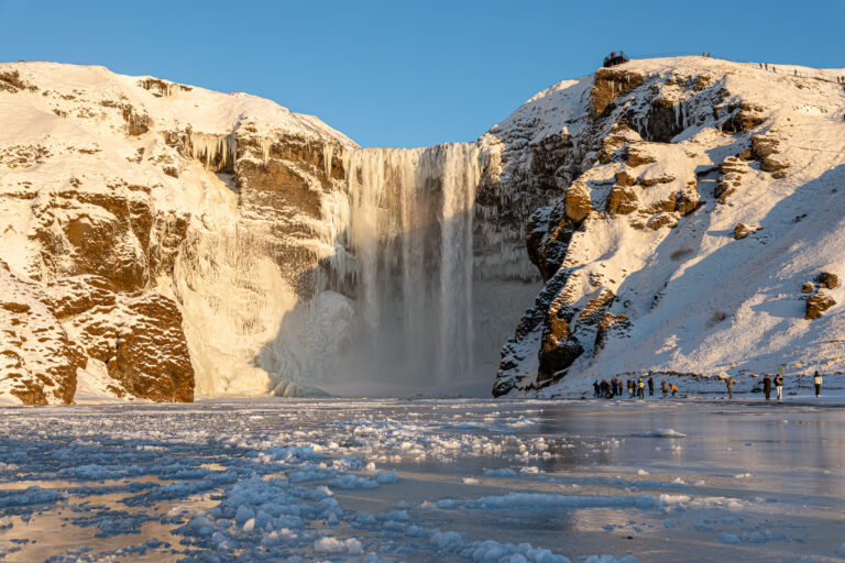 The wintery Skógafoss waterfall in Iceland. Part of the South Coast Tour by Arctic Mike Iceland.