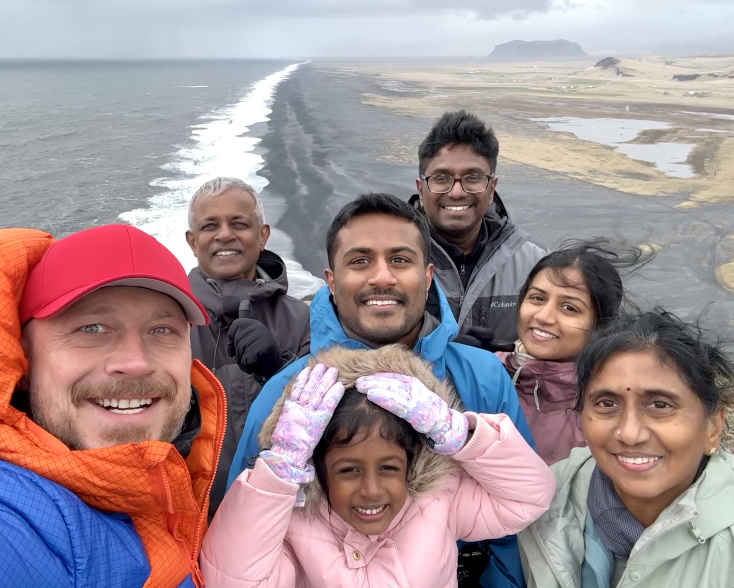 The guide and his guests at the Dyrholaey in Iceland. Part of the South Coast of Iceland tour by Arctic Mike Iceland.